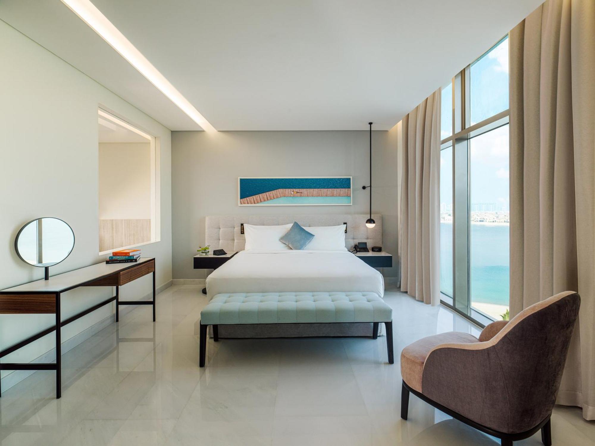Th8 Palm Dubai Beach Resort, Vignette Collection By Ihg Esterno foto A bedroom at the hotel