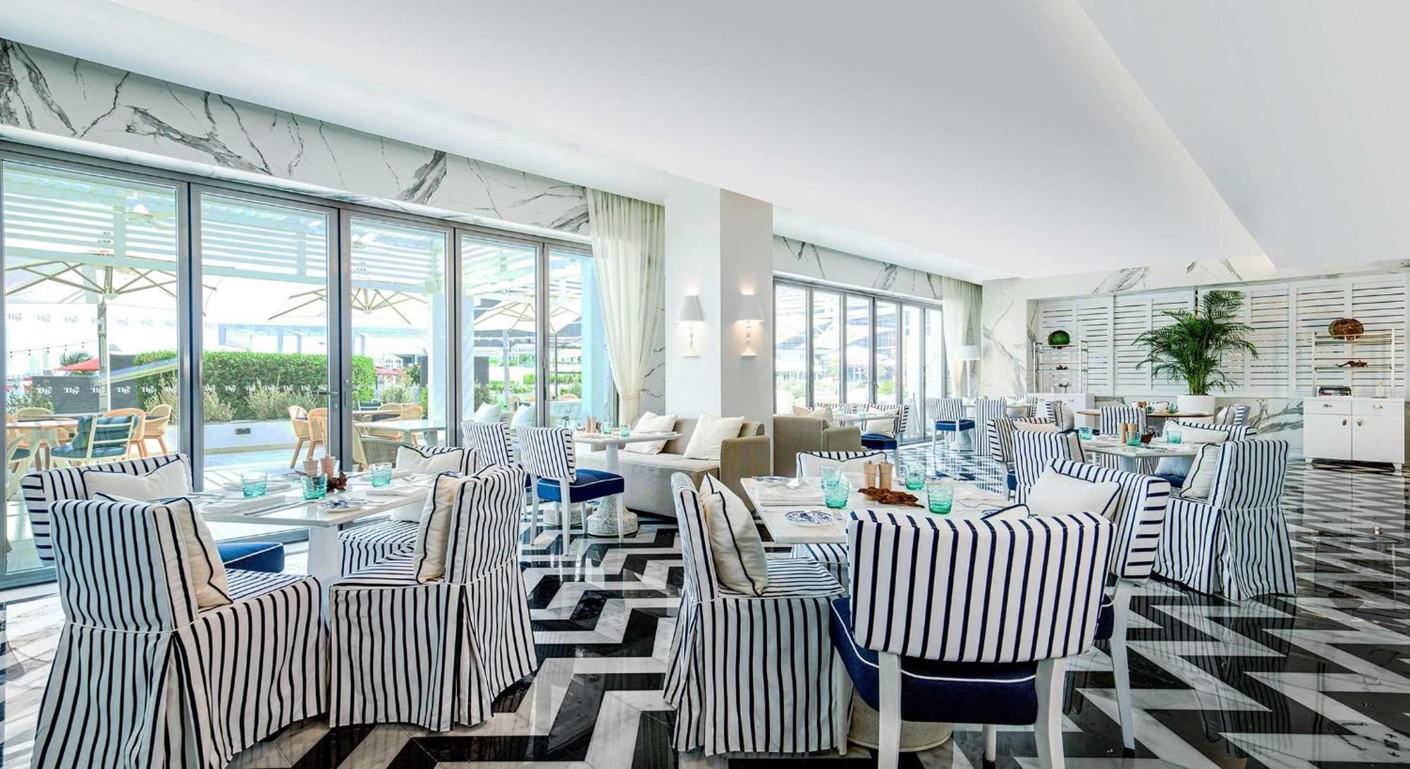 Th8 Palm Dubai Beach Resort, Vignette Collection By Ihg Esterno foto Restaurant
