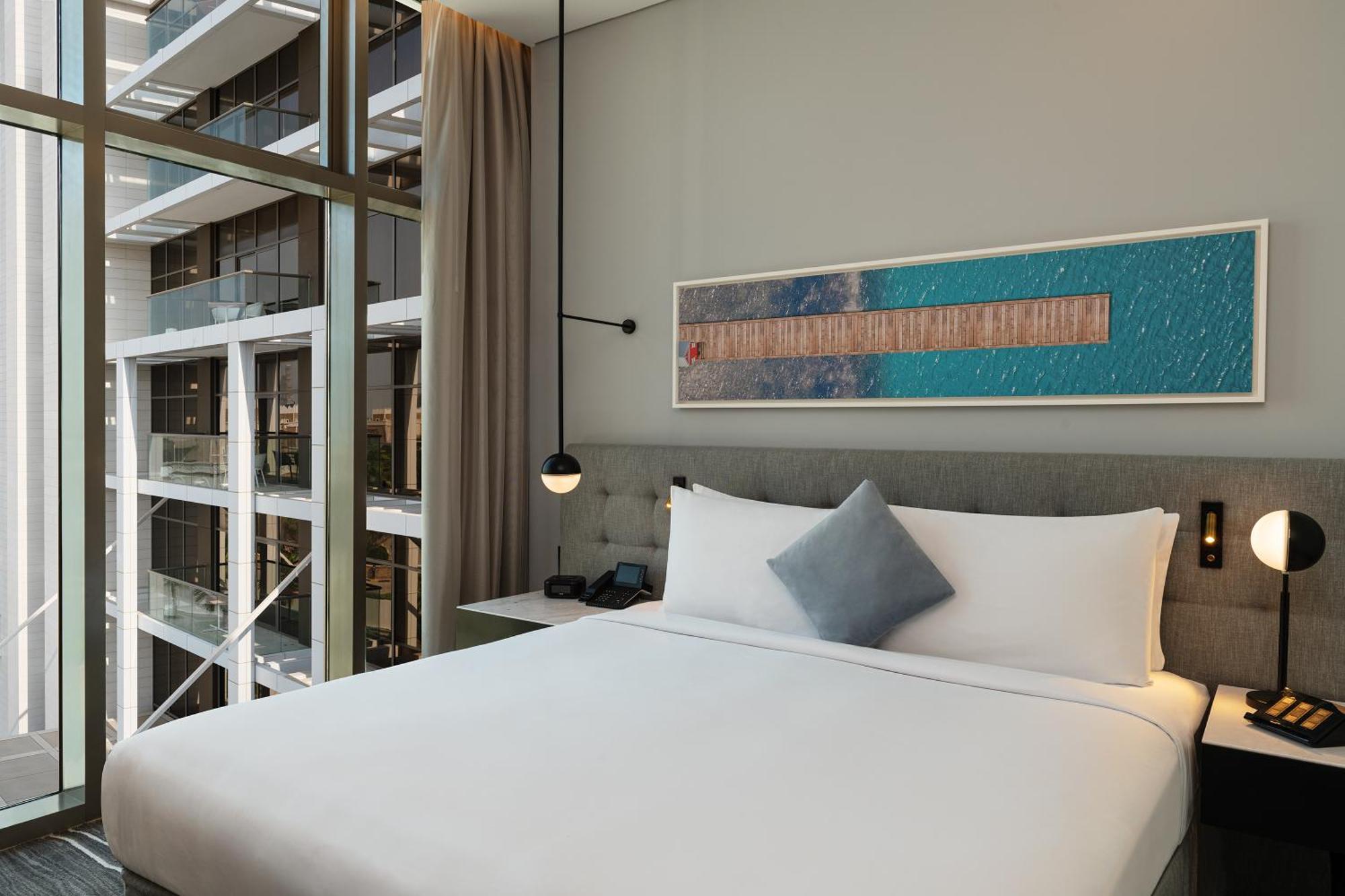 Th8 Palm Dubai Beach Resort, Vignette Collection By Ihg Esterno foto A room at the hotel